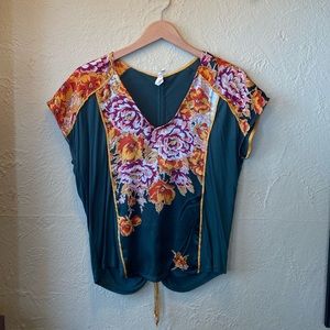 “Tiny” size small green floral blouse